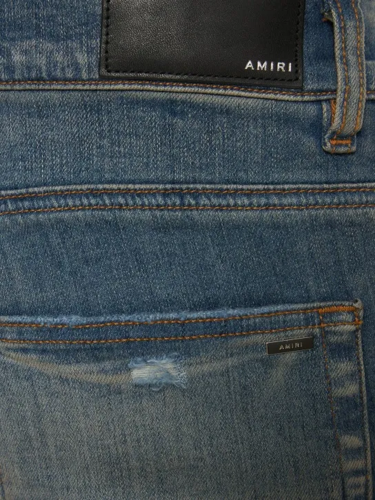 Amiri   Amiri logo distressed jeans 