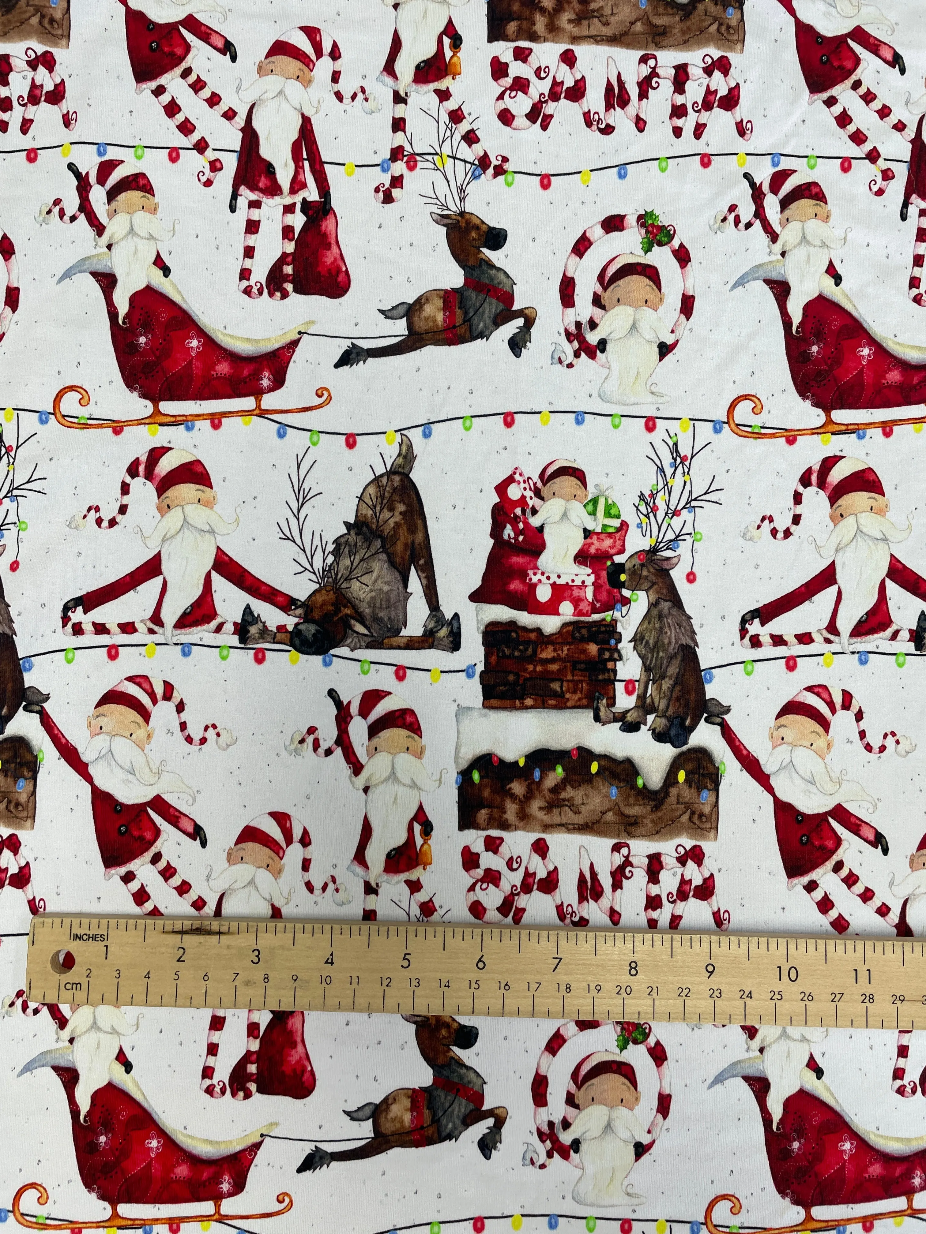 SALE 3/4 YD Cotton/Spandex Remnant - White with Whimsical Santas & Reindeer